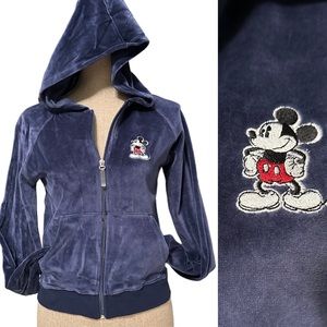 Disney hoodie size medium blue zip up with pockets. New with tags.
